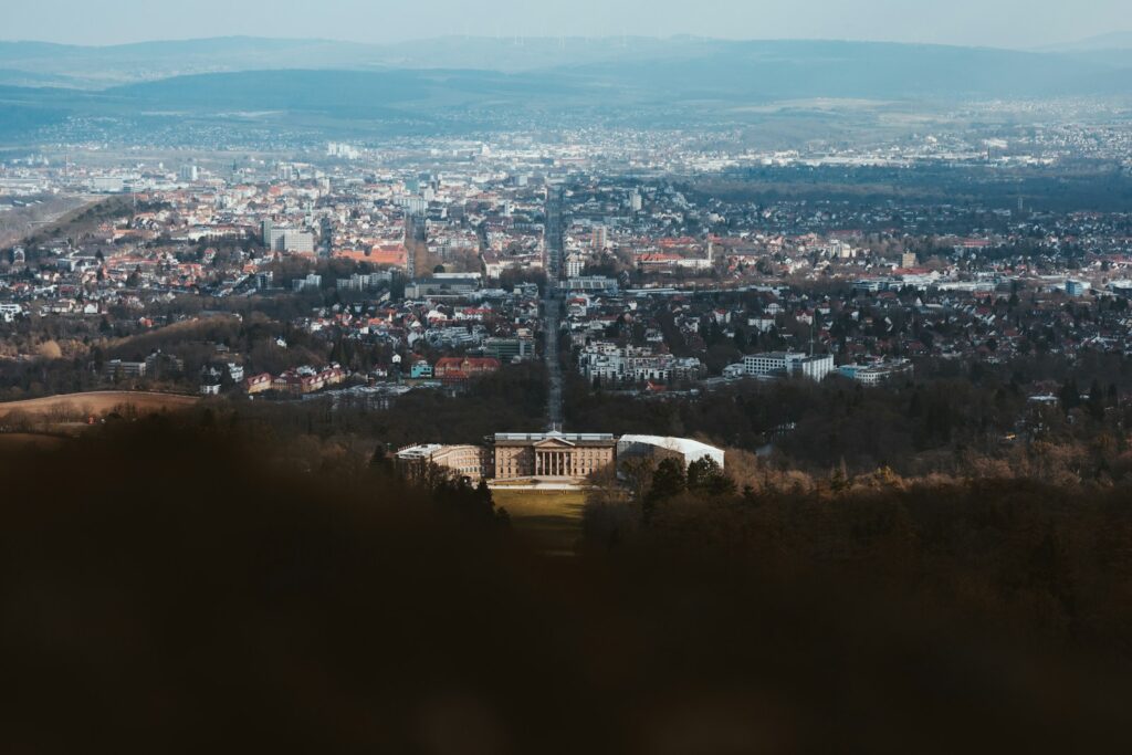 a view of a city from the top of a hill